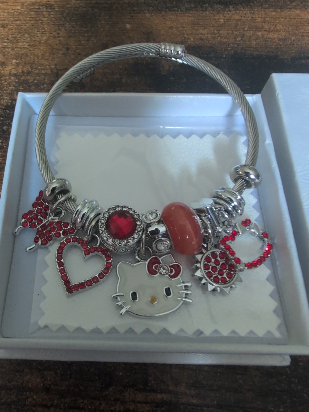 Amazon Silver-tone Hello Kitty Charm Bracelet with Red Accents